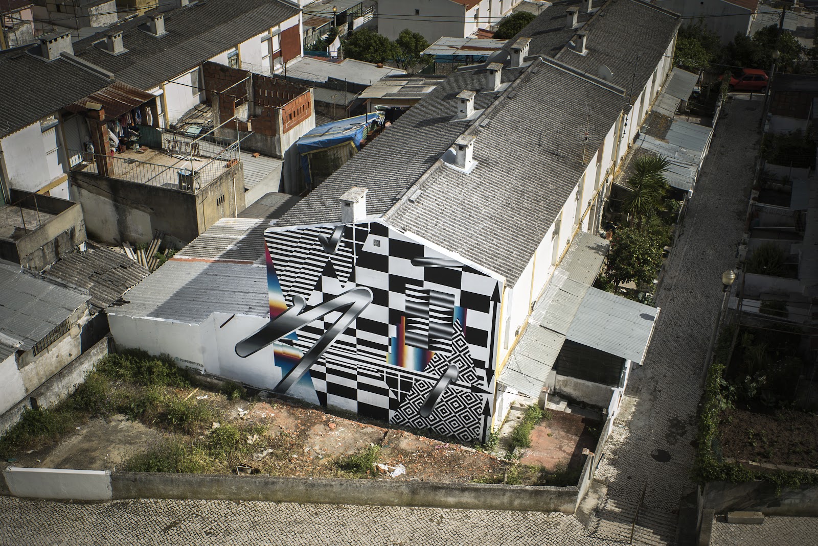 Lisbon, 2016 — foto del Drive del estudio (harvest 2026-07-04) · carpeta lisbon-2016-muro-festival